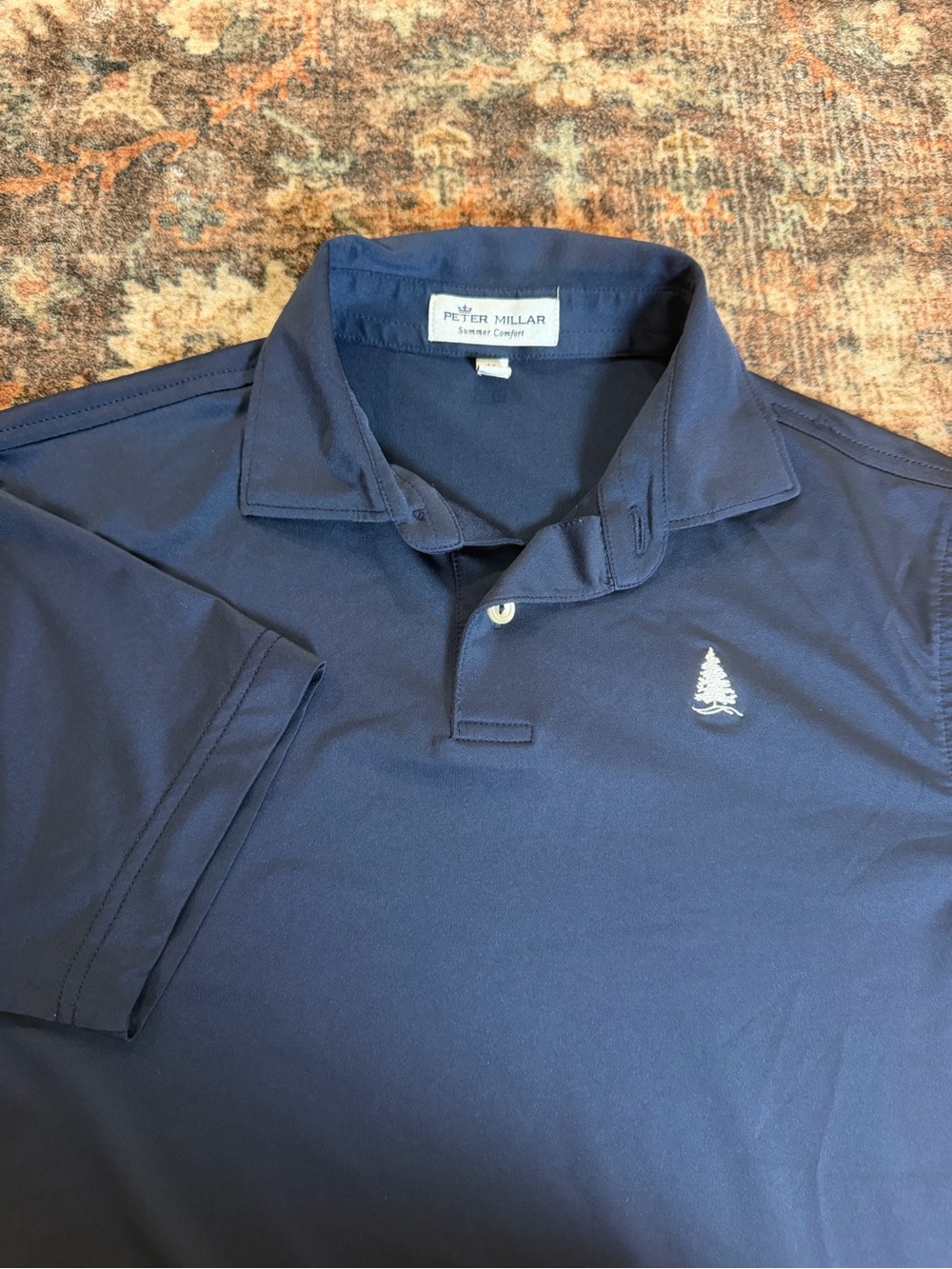 Peter Millar Boy’s size medium Navy Polo Shirt with Embroidered Tree